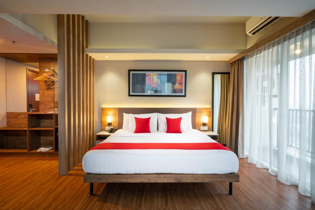 Letto o letti in una camera di Ramada by Wyndham Serpong