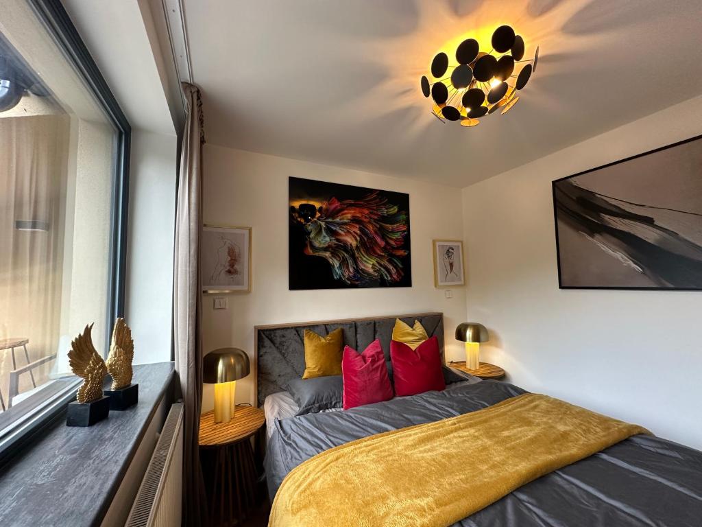 Postel nebo postele na pokoji v ubytování Angel Wings Mountain Apartment Černý Důl