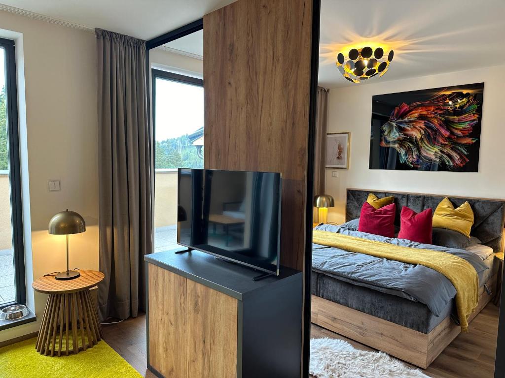 Postel nebo postele na pokoji v ubytování Angel Wings Mountain Apartment Černý Důl