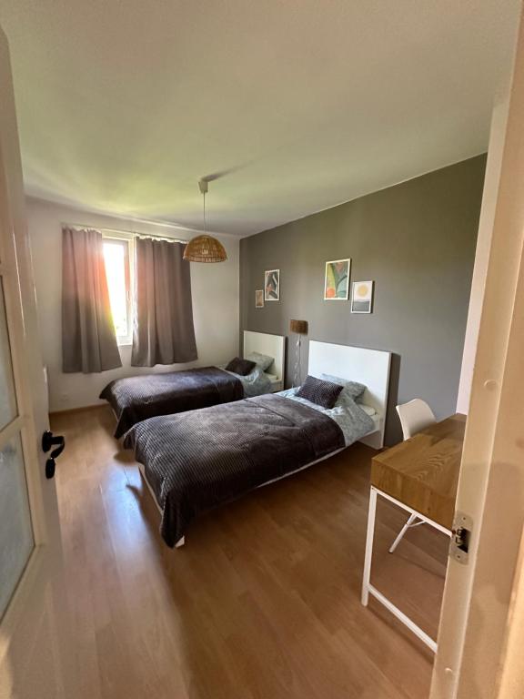 Posteľ alebo postele v izbe v ubytovaní Dekoratoria Apartments