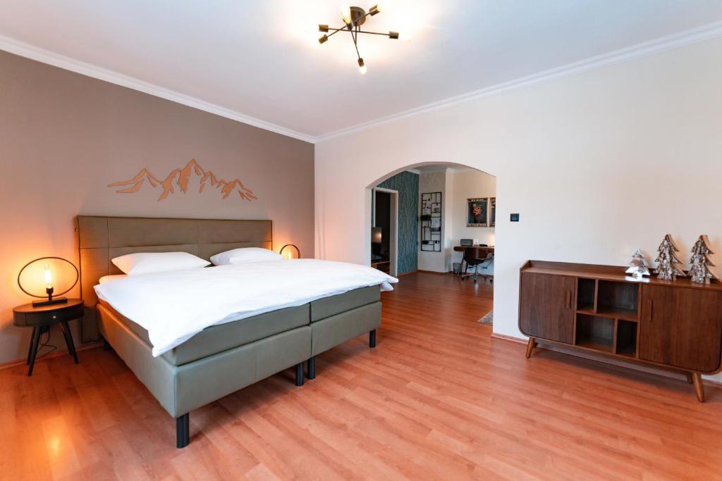 Postel nebo postele na pokoji v ubytování Boutique-Hotel Bayerischer Hof