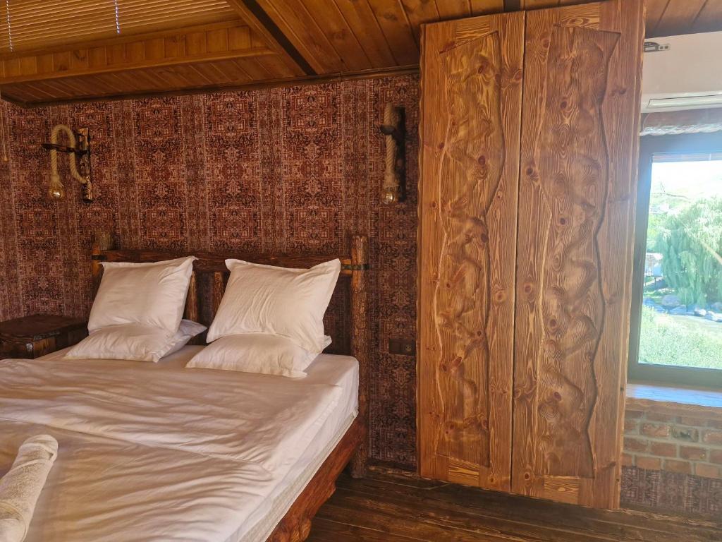 Postel nebo postele na pokoji v ubytování Hotel Riverside Inn