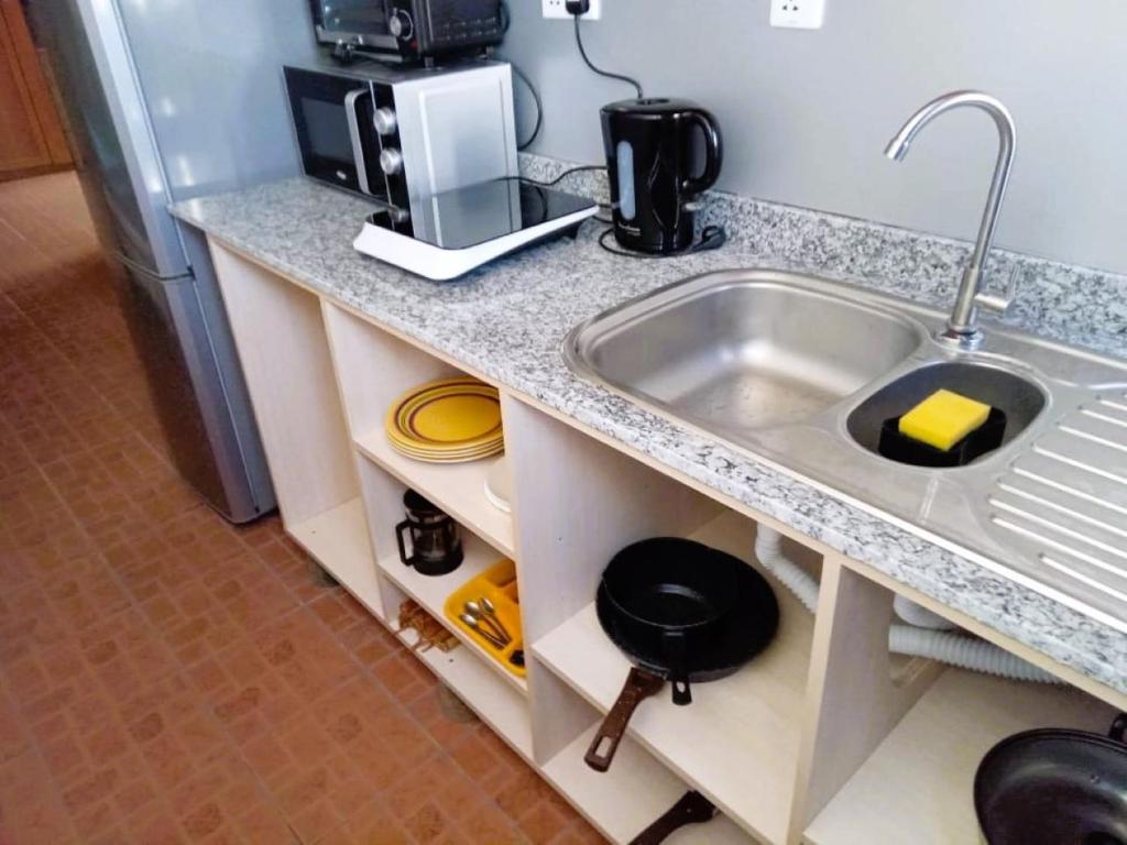 Kuchyň nebo kuchyňský kout v ubytování Chez Pepe Apartments
