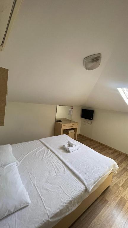 Postel nebo postele na pokoji v ubytování Agartha Suite Hotel Kemer