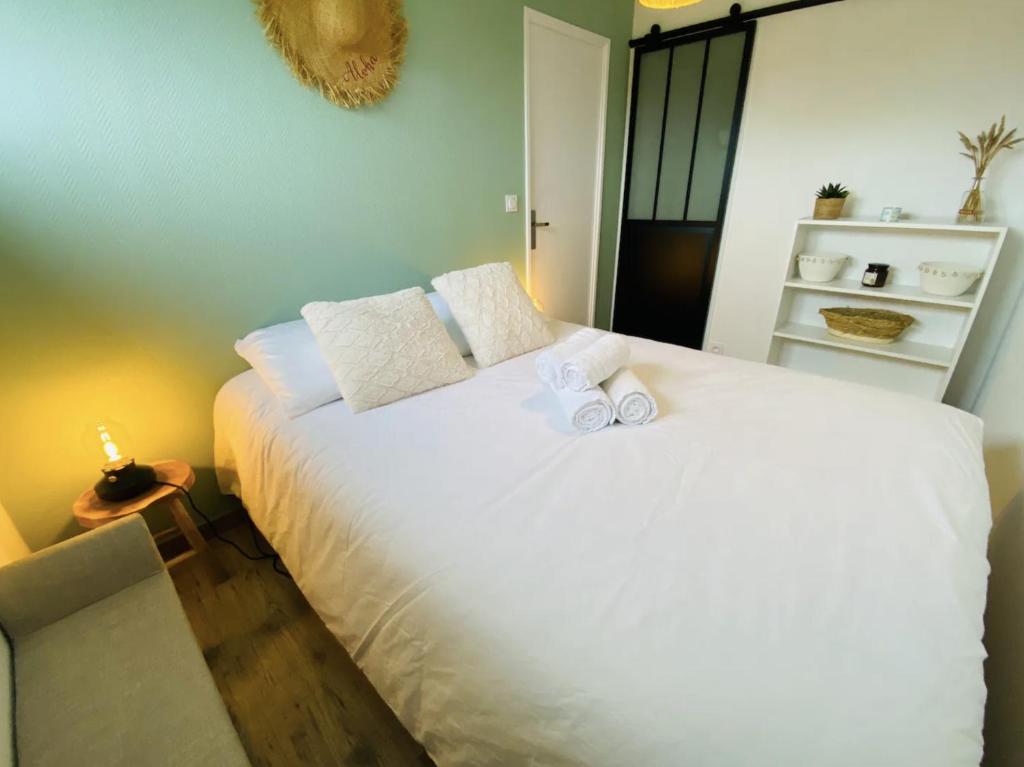 Postel nebo postele na pokoji v ubytování Chez Marcel Cabourg Appartement 2 pièces