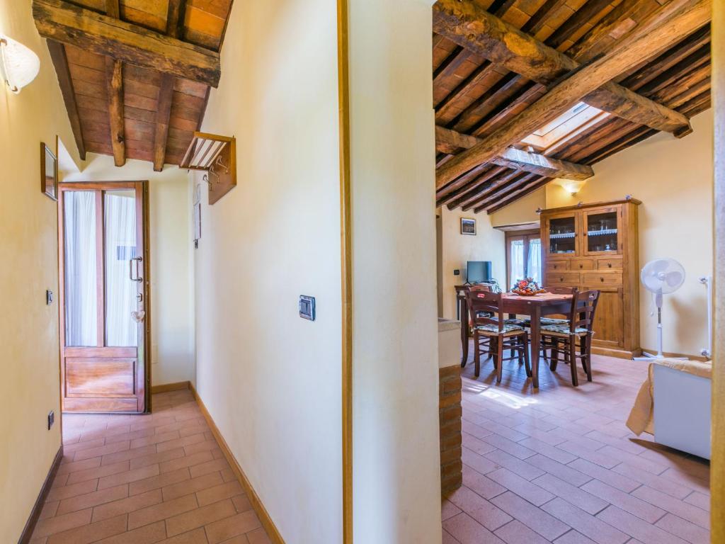 A television and/or entertainment centre at Holiday Home Poggetto Pellegrini by Interhome