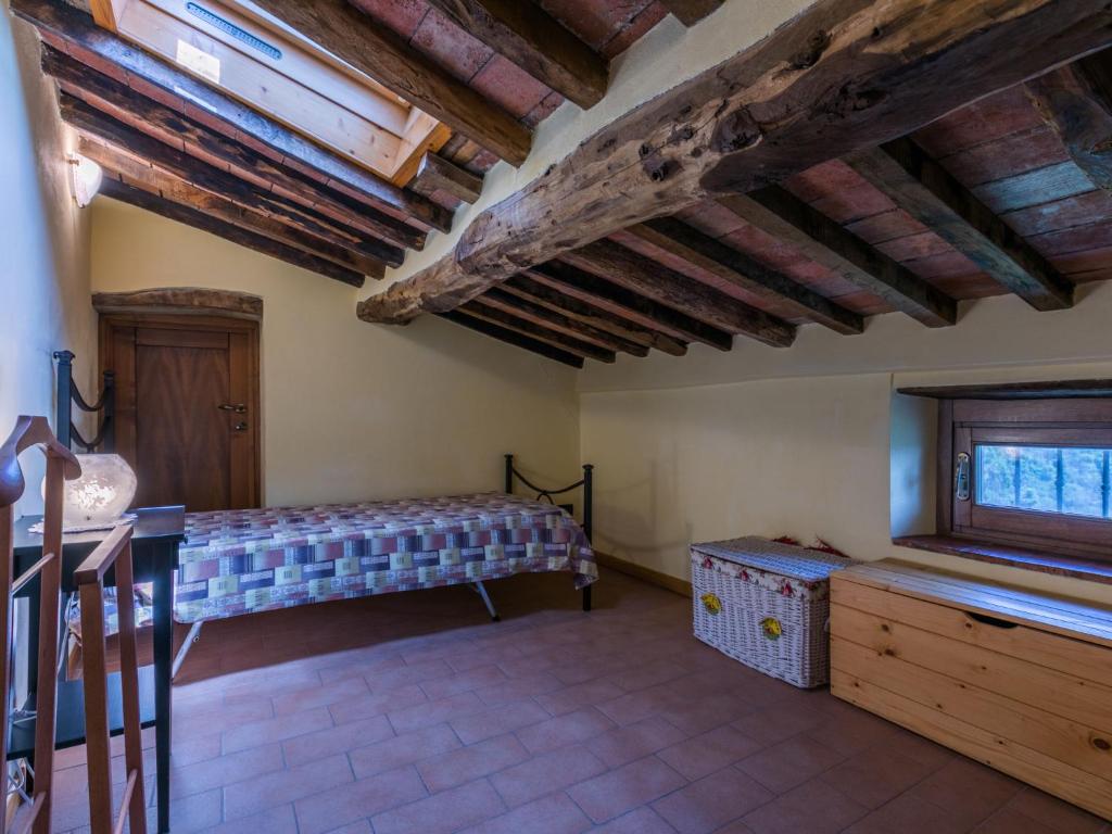 A bed or beds in a room at Holiday Home Poggetto Pellegrini by Interhome
