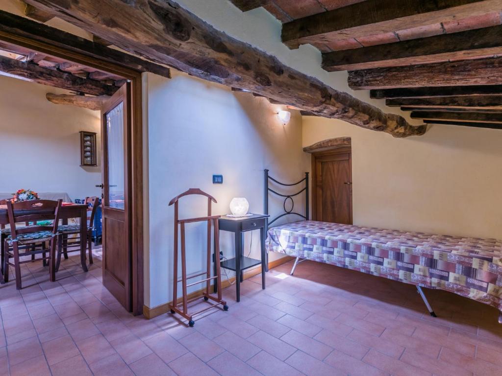 A bed or beds in a room at Holiday Home Poggetto Pellegrini by Interhome