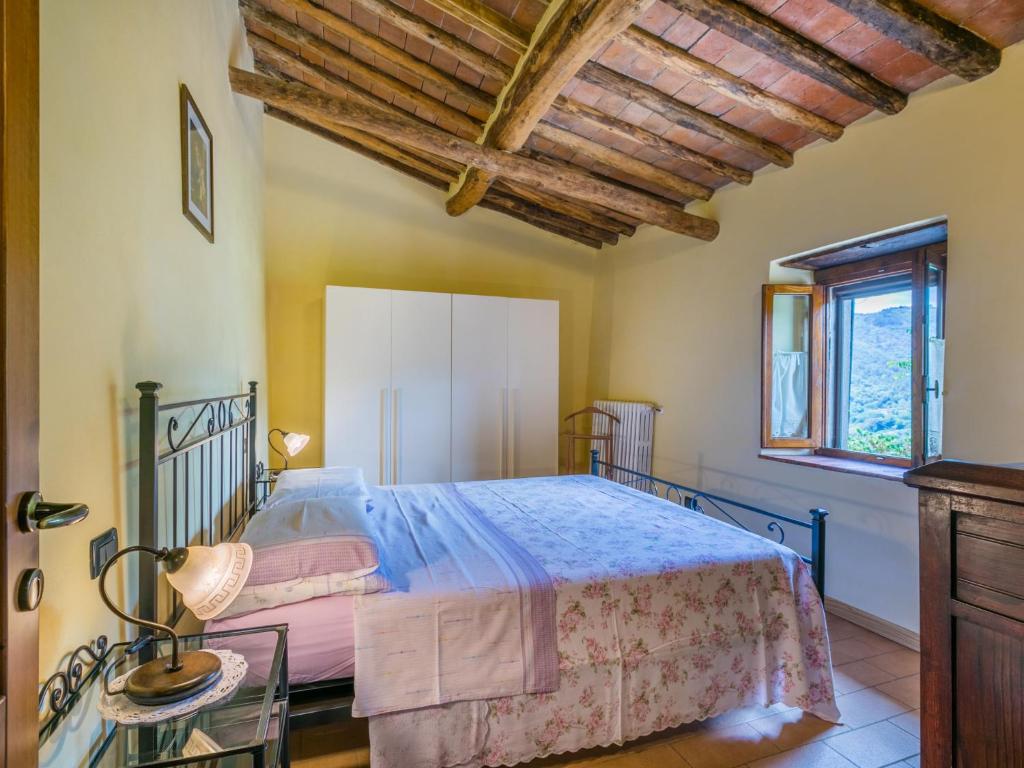 A bed or beds in a room at Holiday Home Poggetto Pellegrini by Interhome