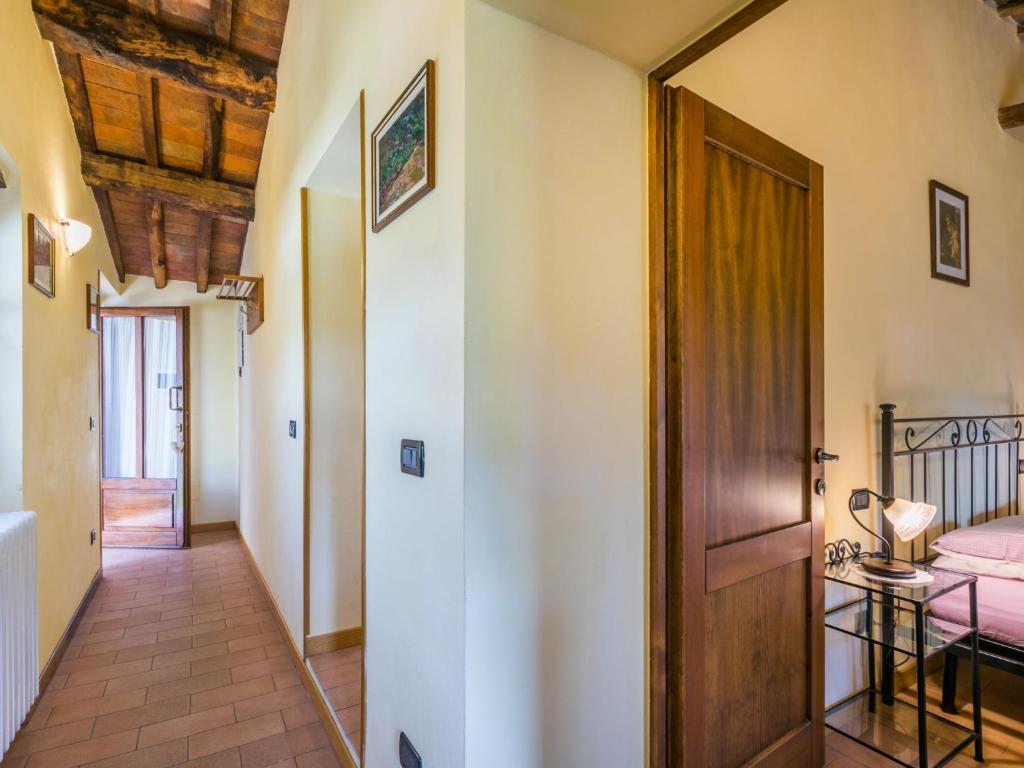 A bed or beds in a room at Holiday Home Poggetto Pellegrini by Interhome