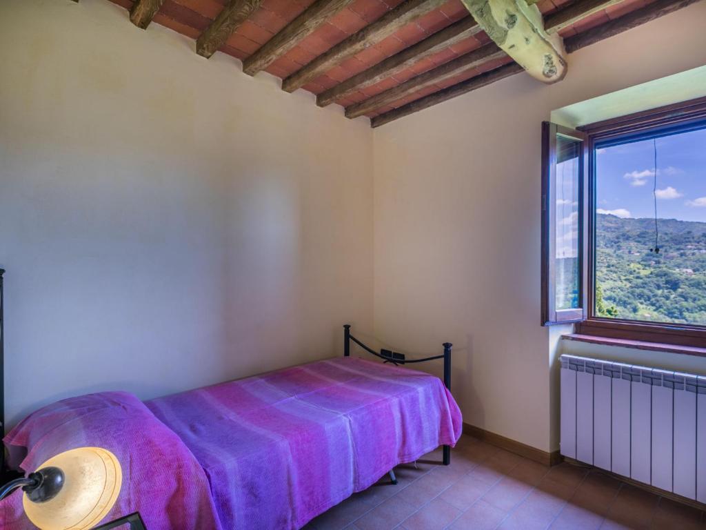 A bed or beds in a room at Holiday Home Poggetto Pellegrini by Interhome