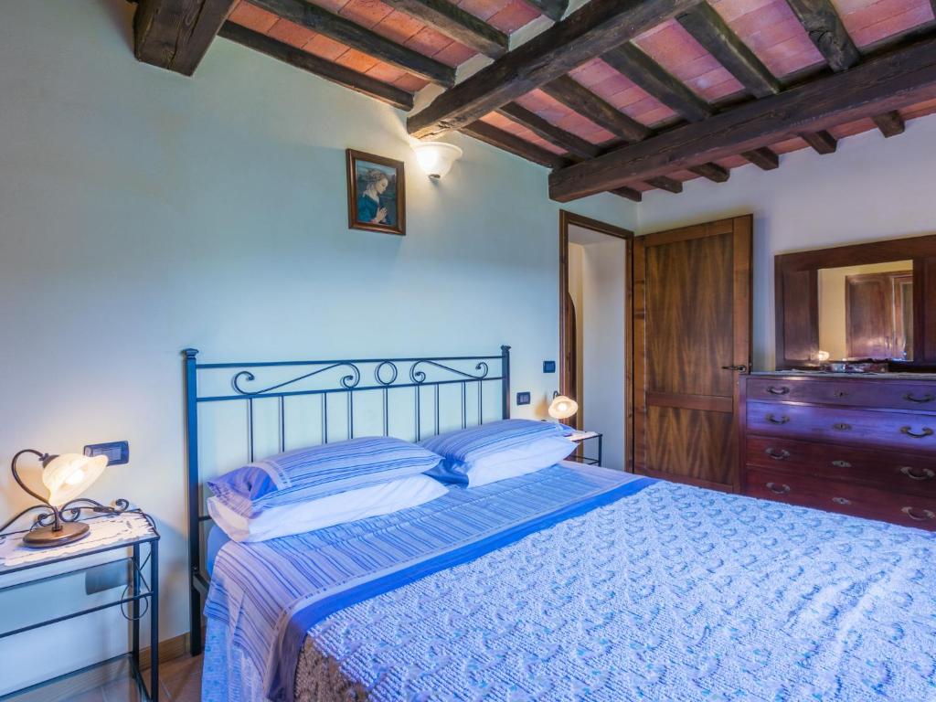 A bed or beds in a room at Holiday Home Poggetto Pellegrini by Interhome