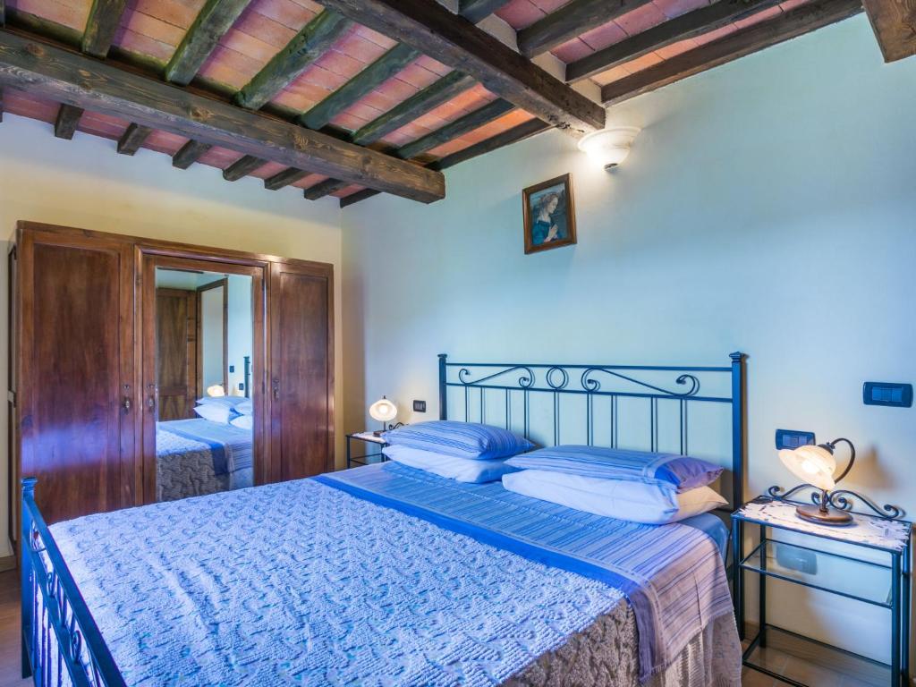 A bed or beds in a room at Holiday Home Poggetto Pellegrini by Interhome