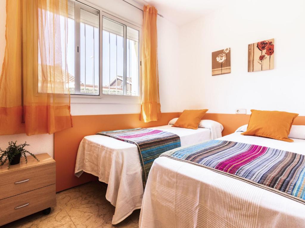 Posteľ alebo postele v izbe v ubytovaní Holiday Home Flamenc 1 by Interhome