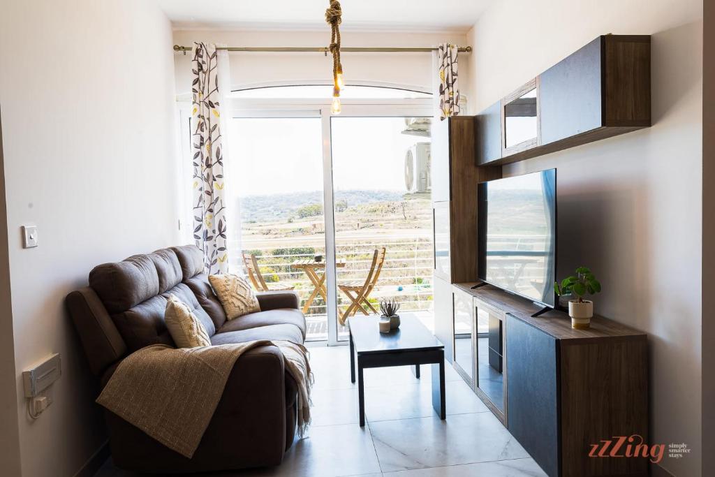 Posezení v ubytování The Gozo Holiday Apartment that Feels like Home