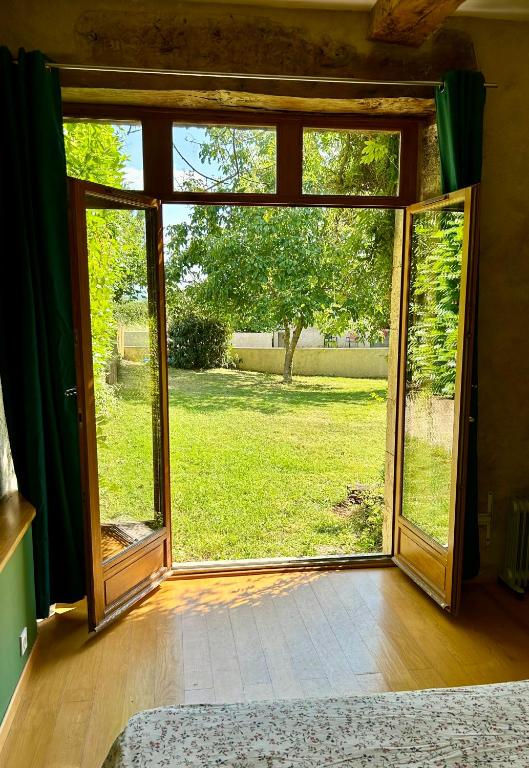 Zahrada ubytování Gîte En Damé with private pool