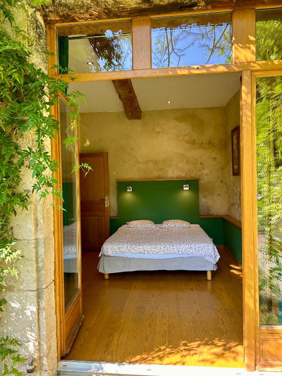 Postel nebo postele na pokoji v ubytování Gîte En Damé with private pool