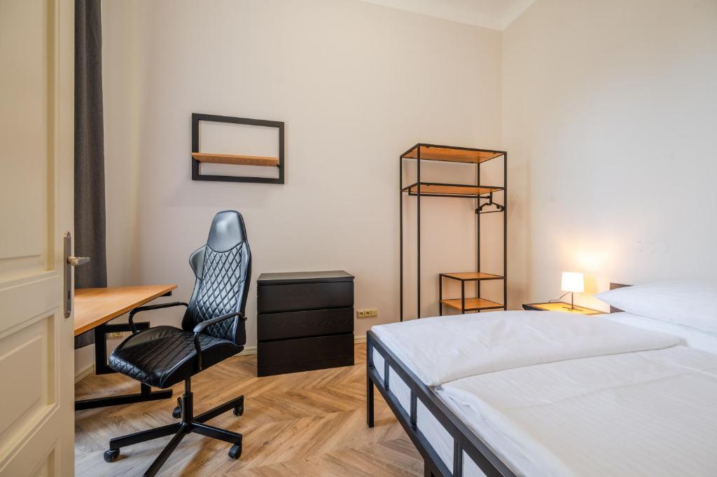 Postel nebo postele na pokoji v ubytování Palace Petrarca