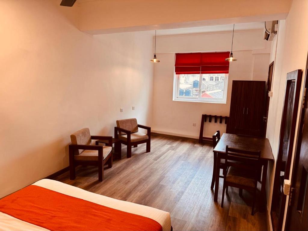 Postel nebo postele na pokoji v ubytování CityRest Fort
