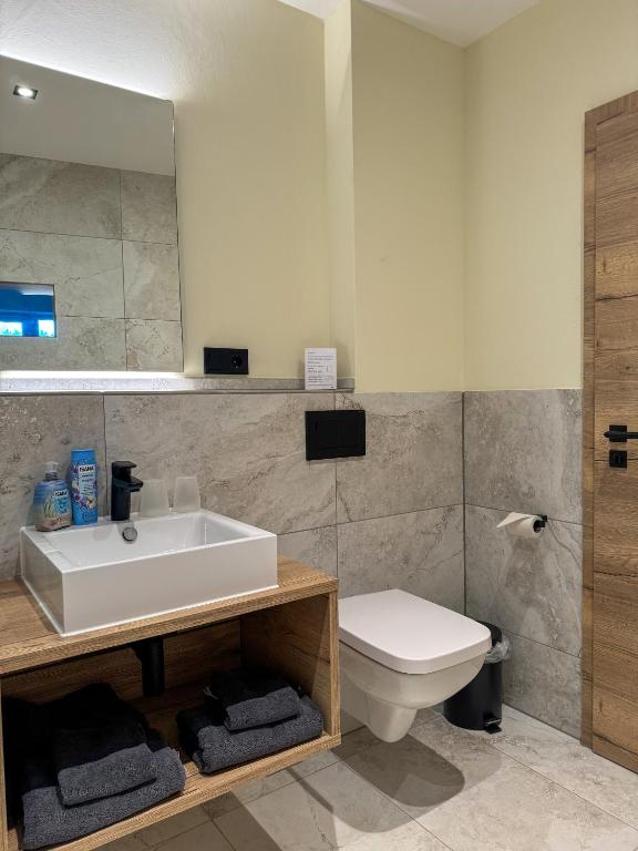 Koupelna v ubytování Veenland Hotel