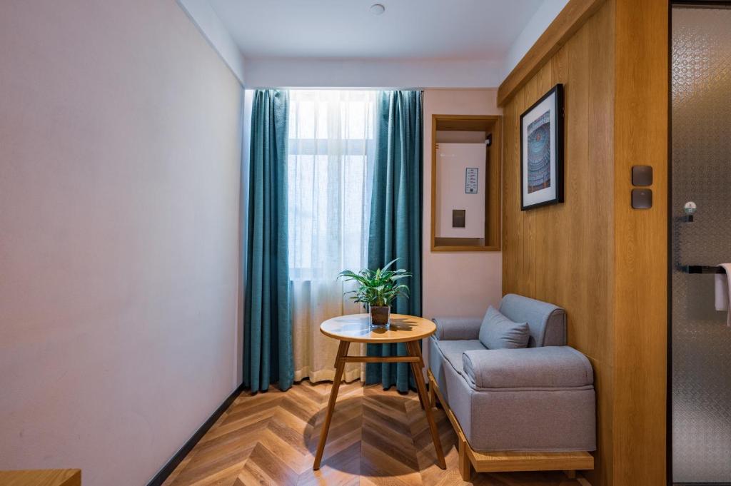 Posezení v ubytování Qiu Guo Hotel Xidan Financial Street Beijing