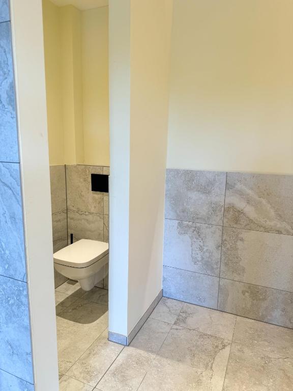 Koupelna v ubytování Veenland Hotel