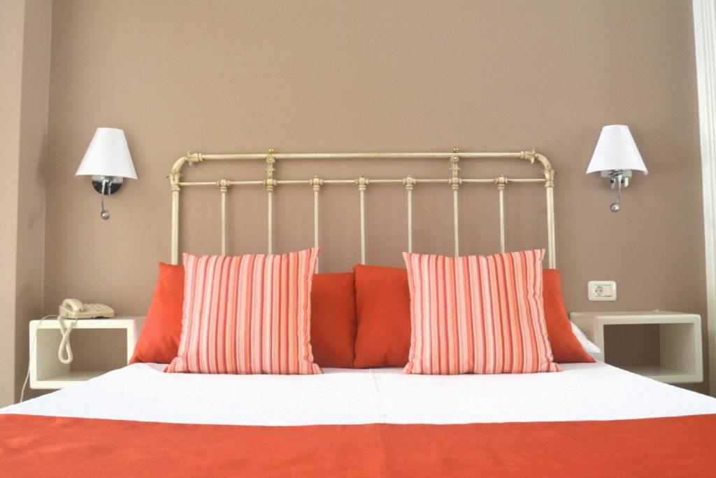 Postel nebo postele na pokoji v ubytování Hotel RF Astoria - Adults Only