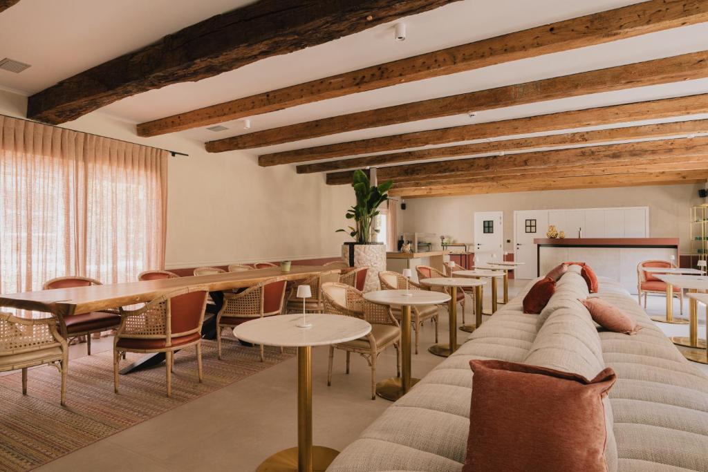 Posezení v ubytování Hotel De Baian