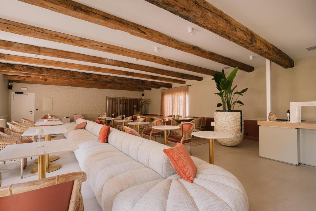 Posezení v ubytování Hotel De Baian