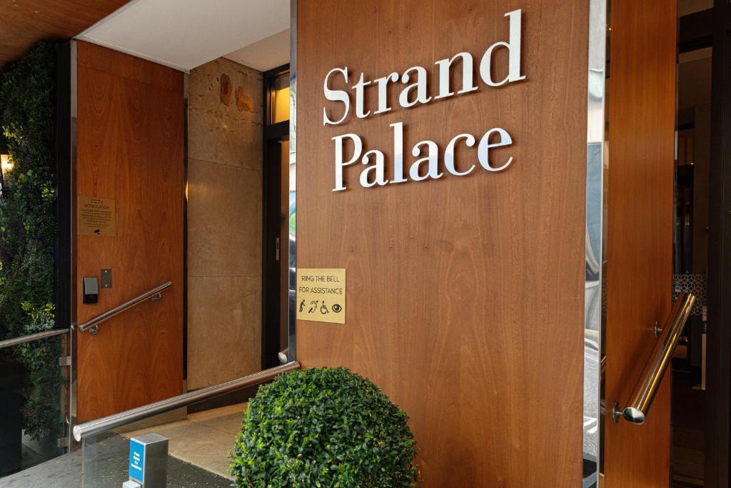 a stand palace sign on the side of a building at Strand Palace in London