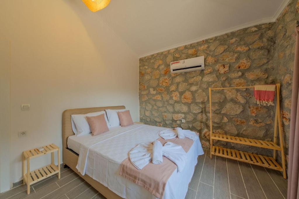Postel nebo postele na pokoji v ubytování İrisVilla