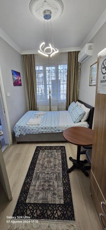 Postel nebo postele na pokoji v ubytování Taksim Millennium Suit Hotel