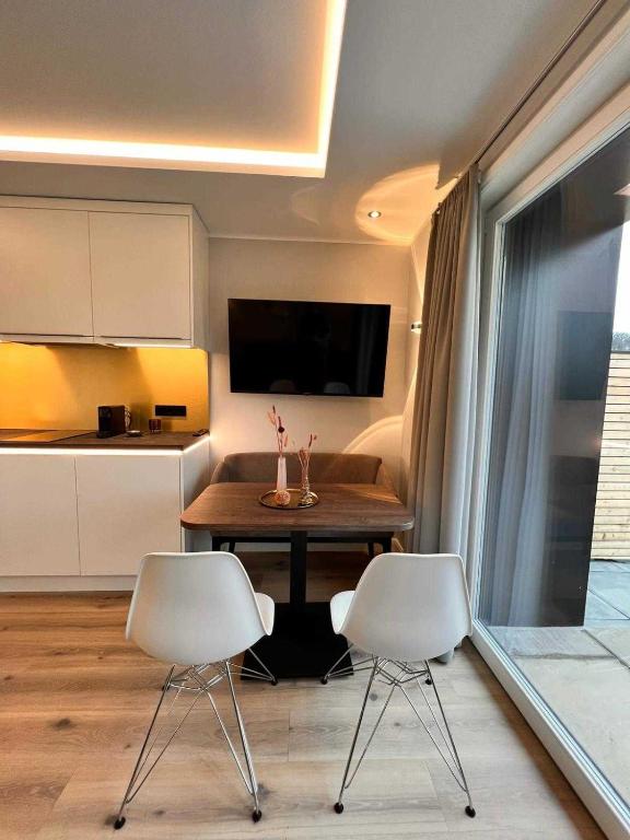 DRIEHOF Lifestyle Comfort Apartment 3にあるテレビまたはエンターテインメントセンター