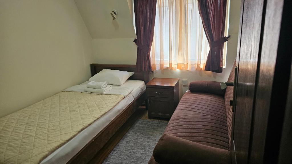 Postel nebo postele na pokoji v ubytování DuoD