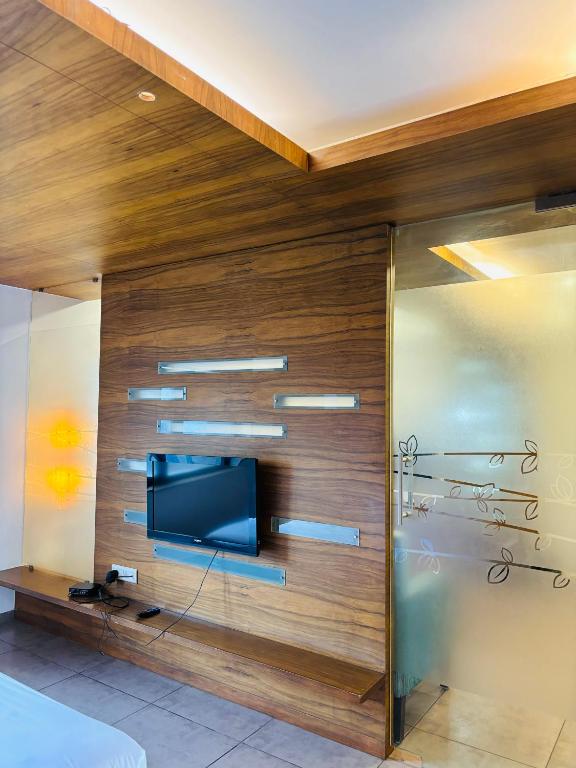 TV a/nebo společenská místnost v ubytování Hotel Kanan