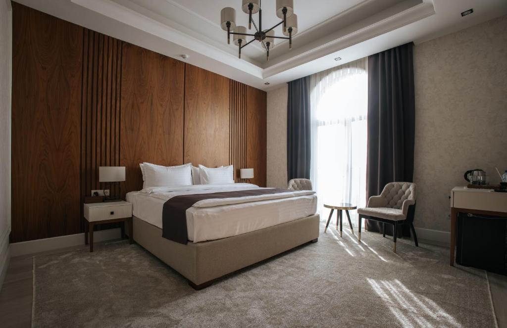 Postel nebo postele na pokoji v ubytování Ametist Hotel Complex