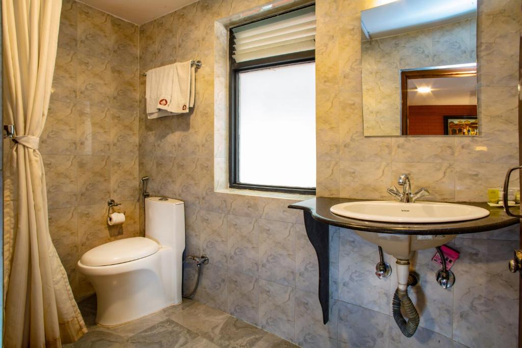 Koupelna v ubytování Taleju Boutique Hotel