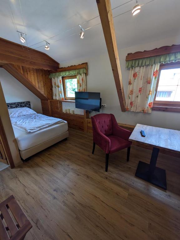 Postel nebo postele na pokoji v ubytování Pension Kirchleitn