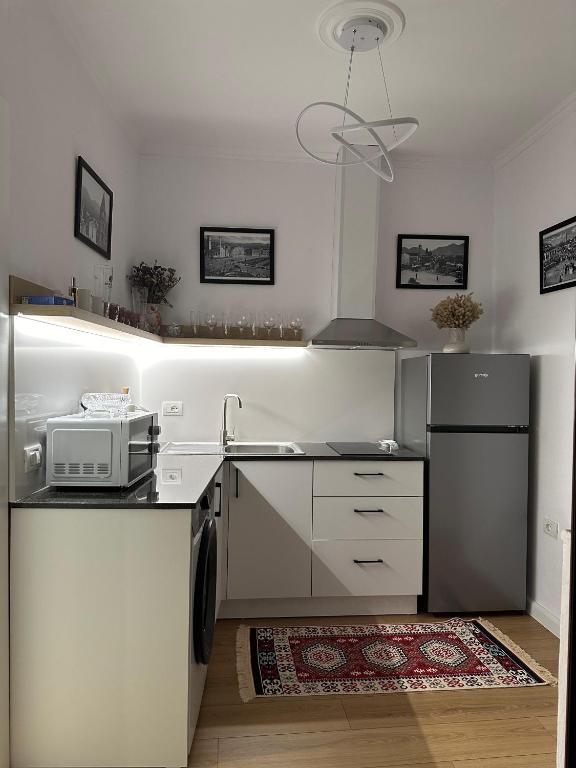 Kuchyň nebo kuchyňský kout v ubytování SEN Garden Home