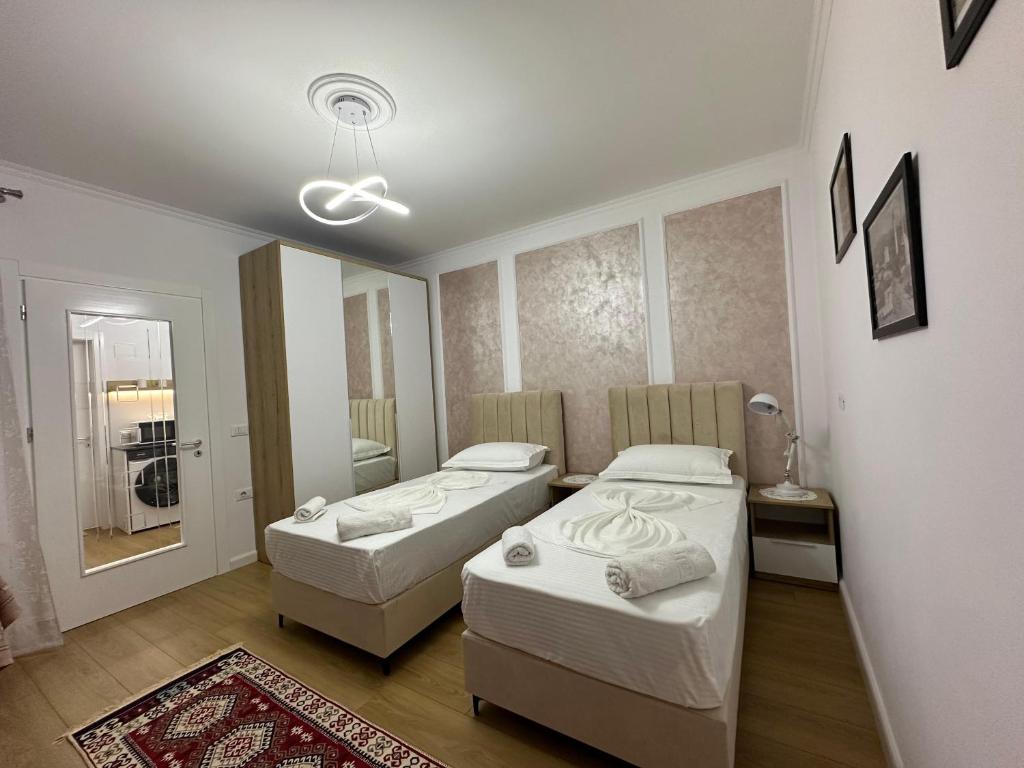 Postel nebo postele na pokoji v ubytování SEN Garden Home