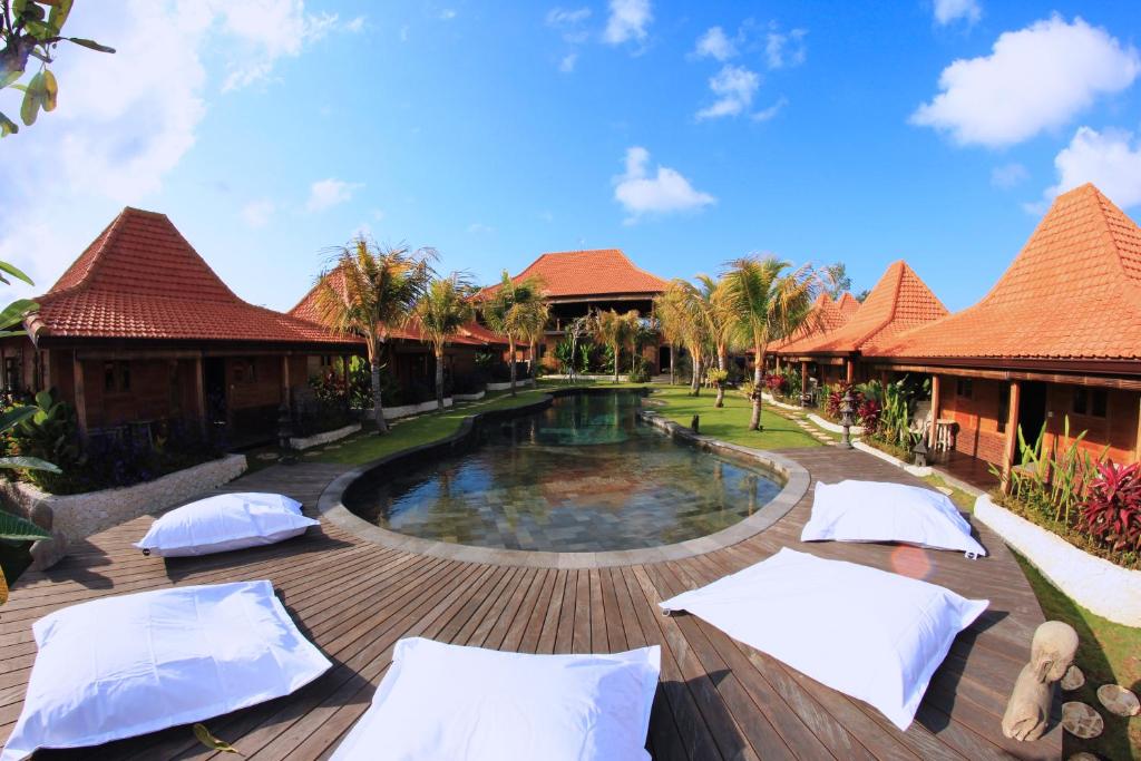 Der Swimmingpool an oder in der Nähe von Yoga Searcher Bali