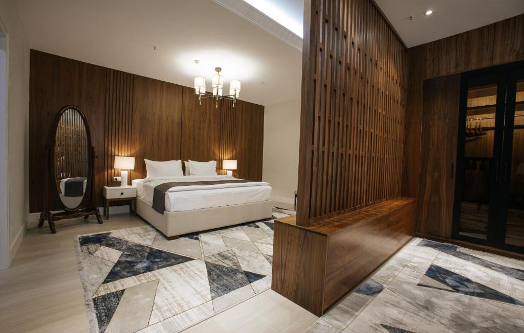 Postel nebo postele na pokoji v ubytování Ametist Hotel Complex