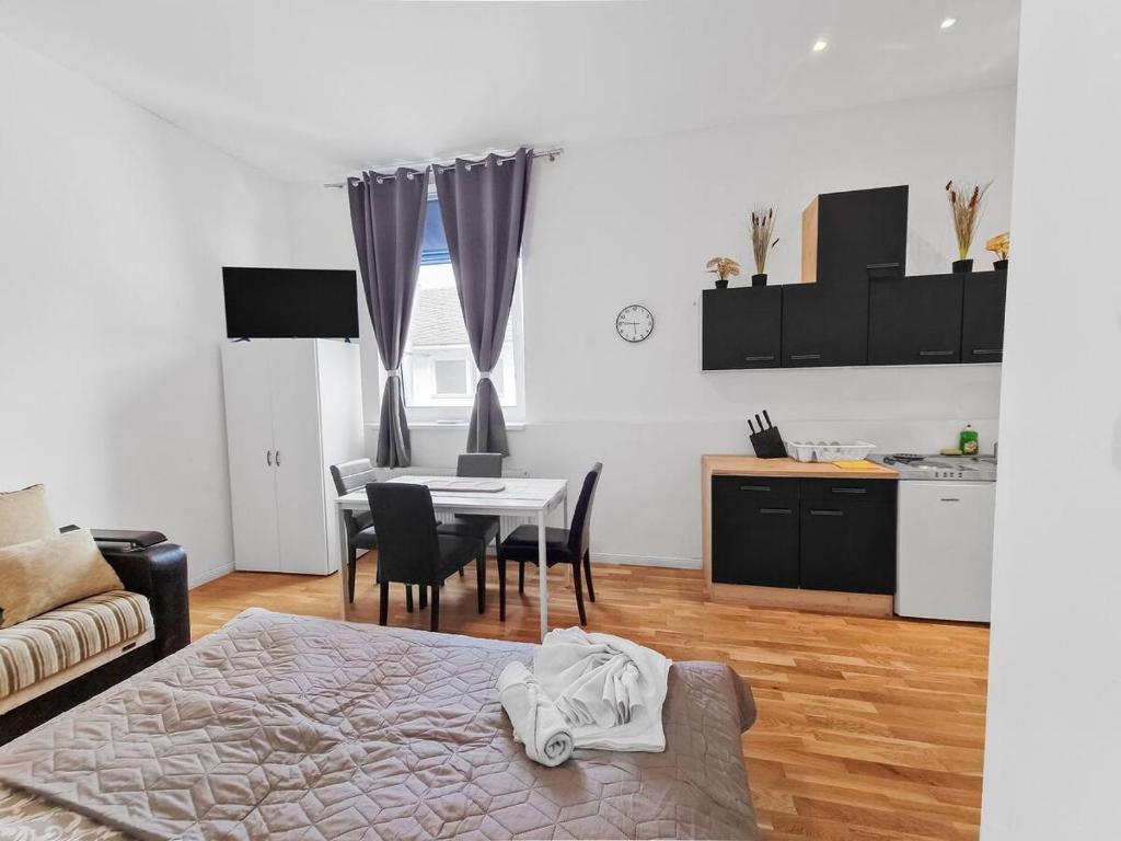 Postel nebo postele na pokoji v ubytování Twin Stay Studio