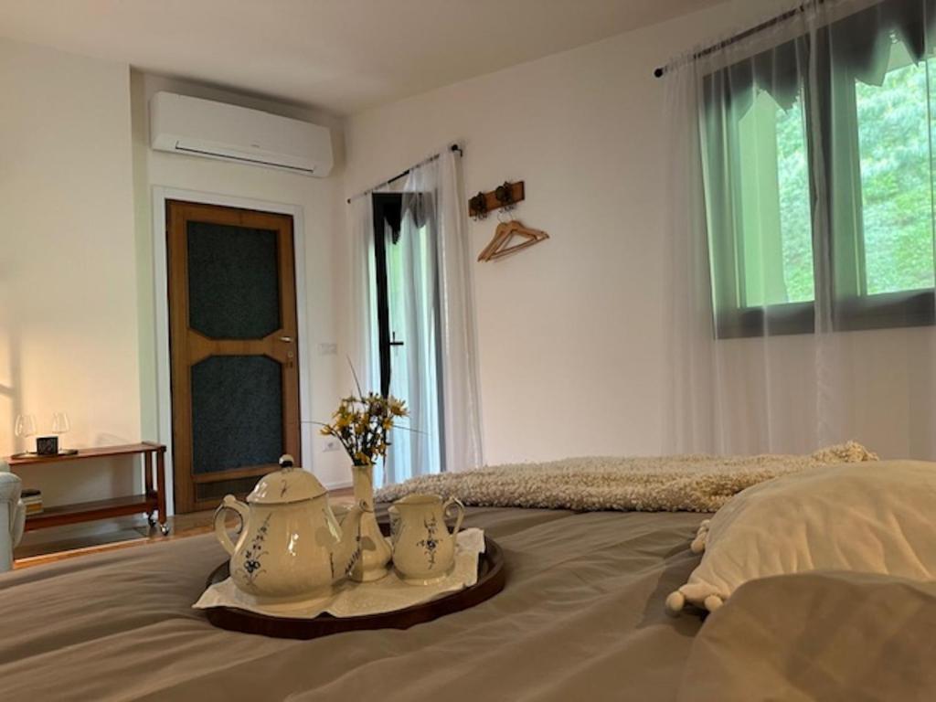 Postel nebo postele na pokoji v ubytování Villa D'ALBA guest house