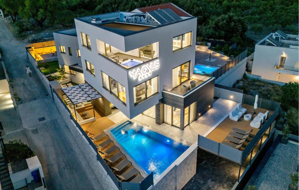 an aerial view of a house with a swimming pool at Stunning Home In Makarska With Sauna in Makarska