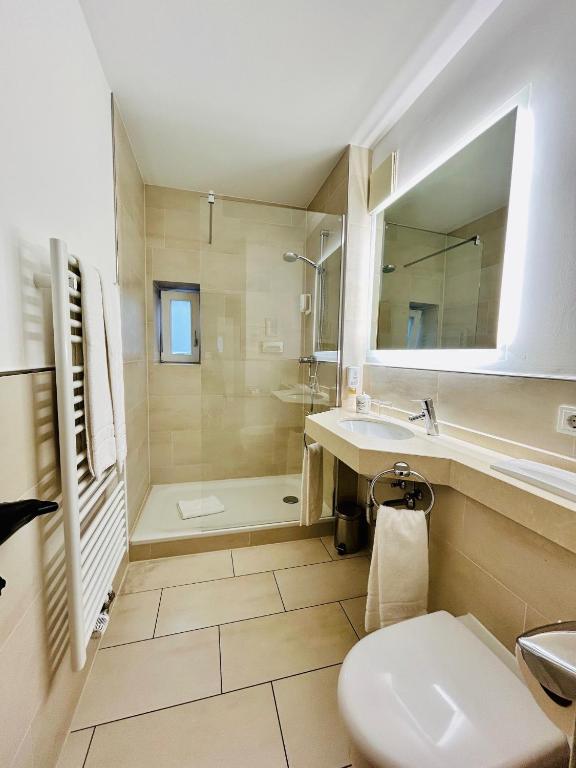 Koupelna v ubytování Hotel Fischerhaus