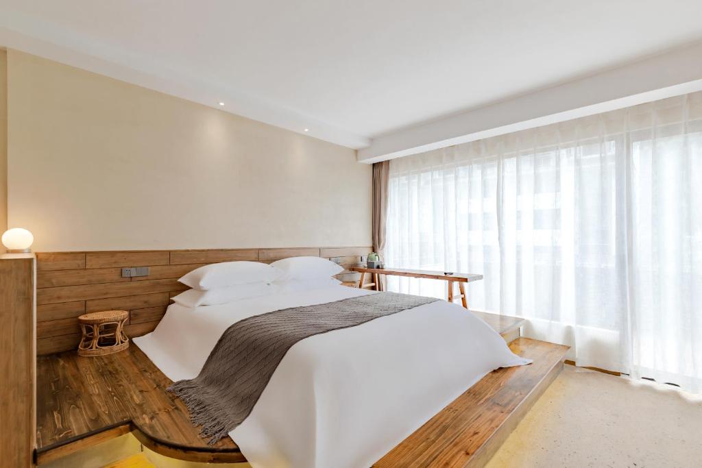 Letto o letti in una camera di 问安民宿（黄山风景区店）