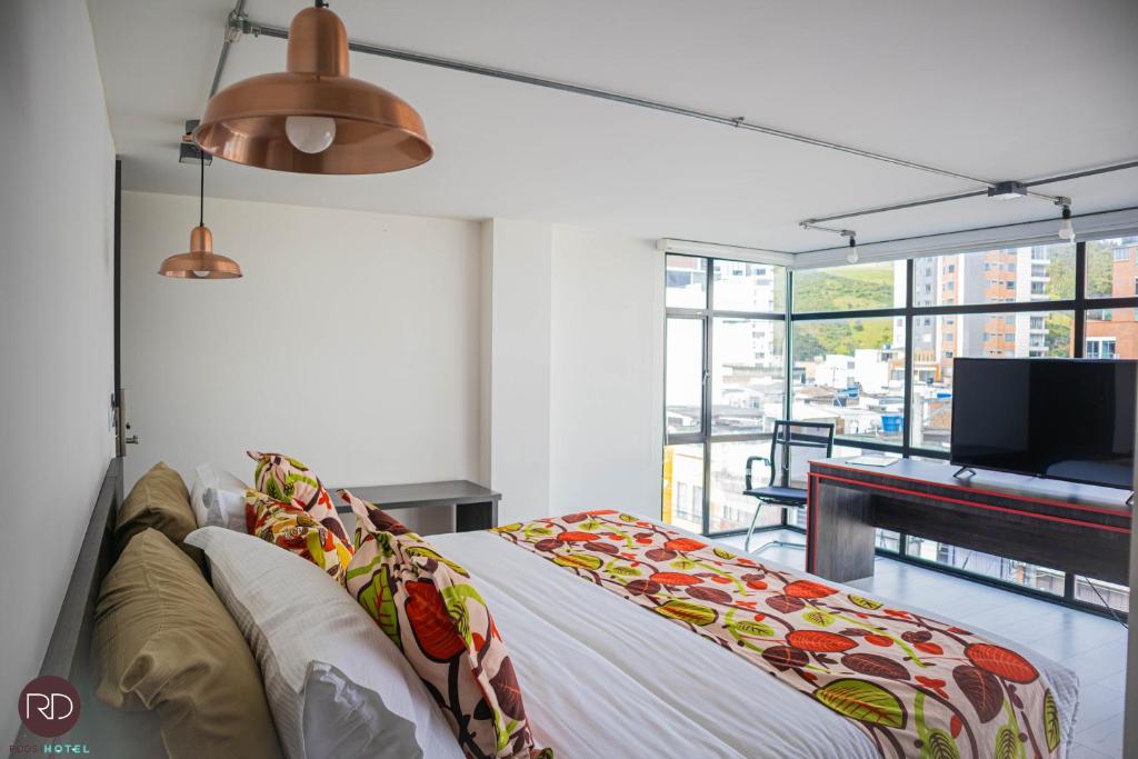 Postel nebo postele na pokoji v ubytování Hotel RDOS
