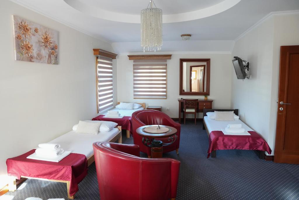 Postel nebo postele na pokoji v ubytování Comfort Lodge