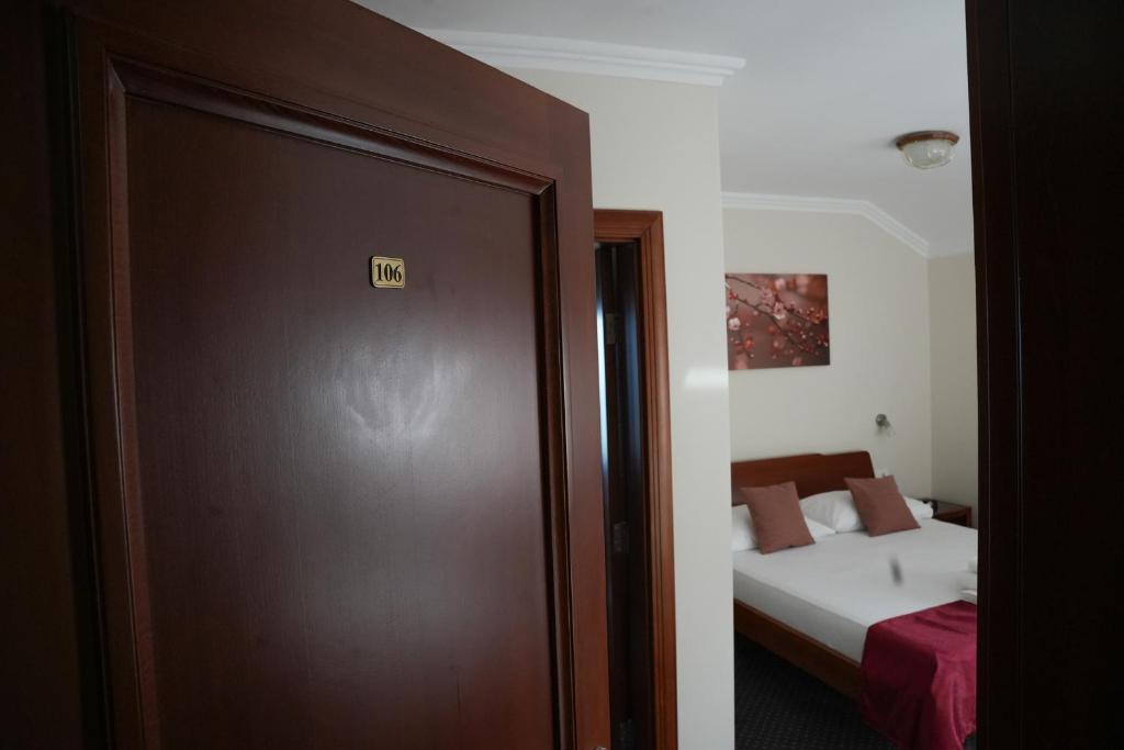 Postel nebo postele na pokoji v ubytování Comfort Lodge